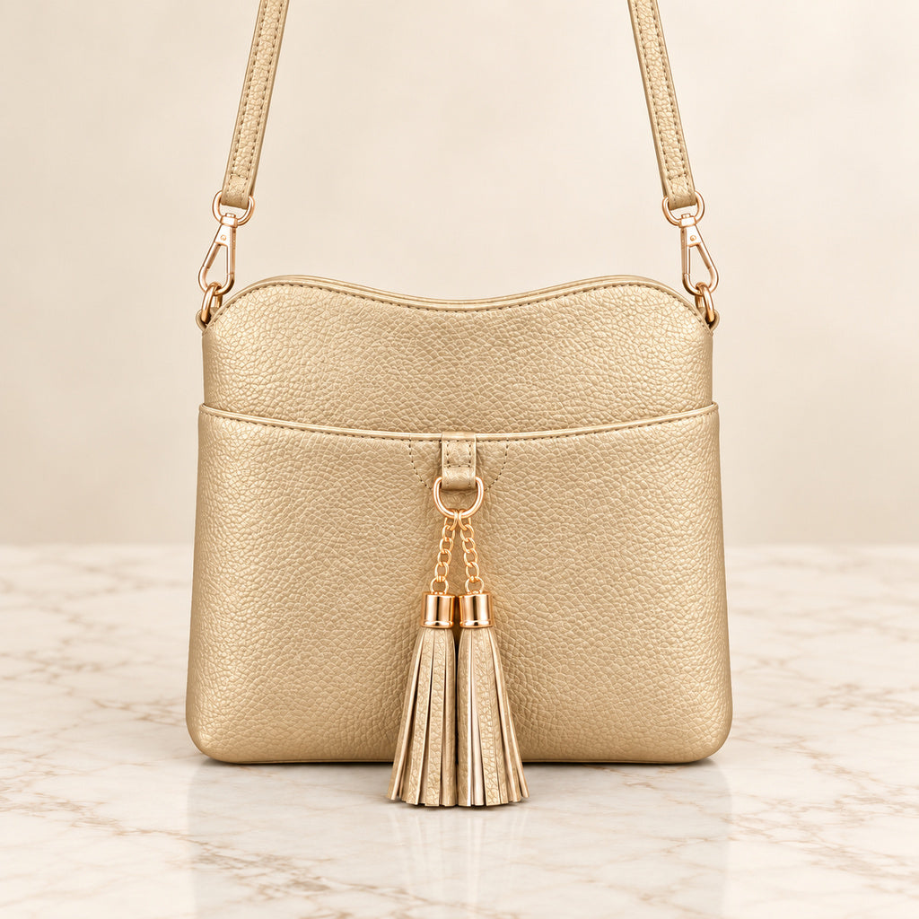 Cartera de borlas dorada, vista completa