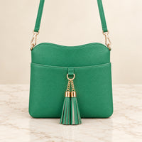 Cartera de borlas verde