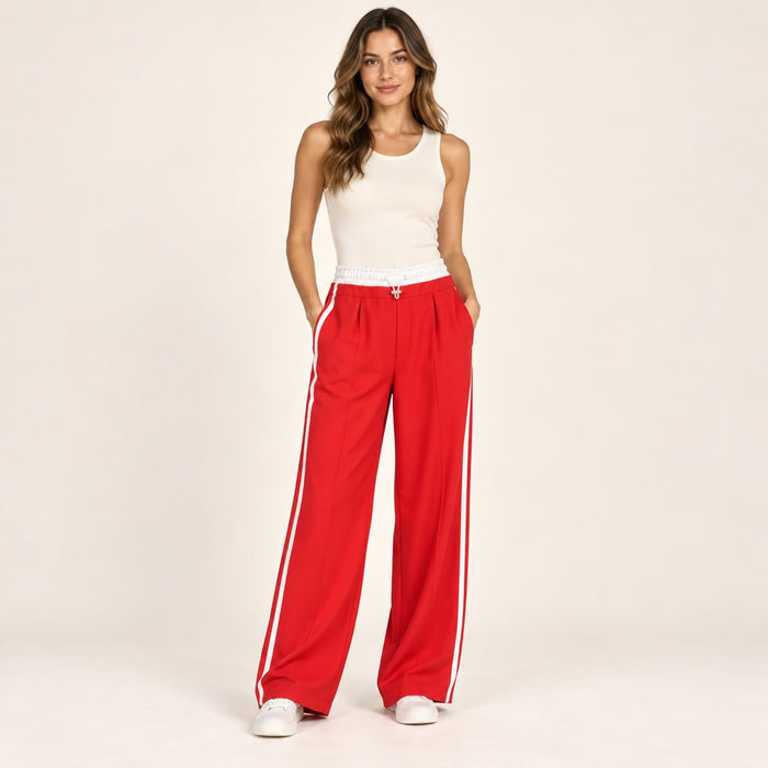 Modelo virtual creada con IA — red wide track pants white waistband and two white side stripes
