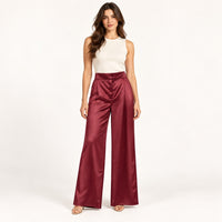 Modelo virtual creada con IA — wine burgundy satin wide trousers, exact waist and silhouette from reference