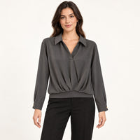 Modelo virtual creada con IA — black long sleeve collared deep V blouse with twisted front hem