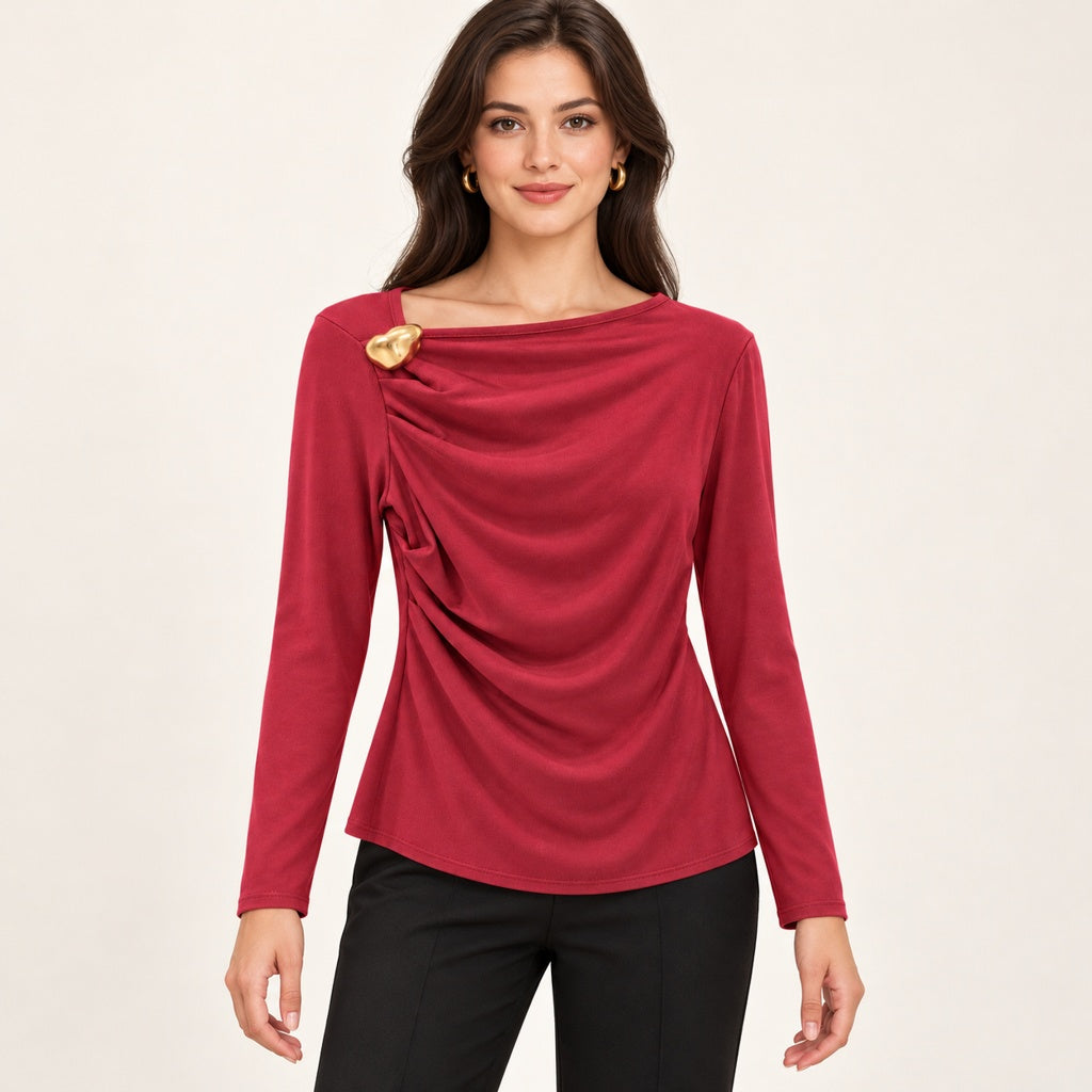 Modelo virtual creada con IA — wine long sleeve asymmetrical draped neckline blouse with gold brooch on shoulder