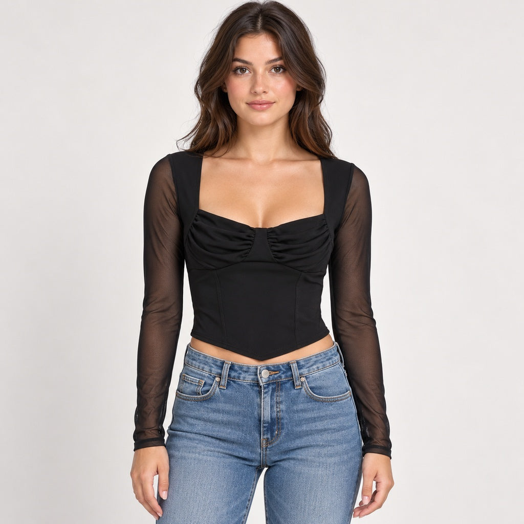 Top Jacaranda negro con mangas de malla en modelo