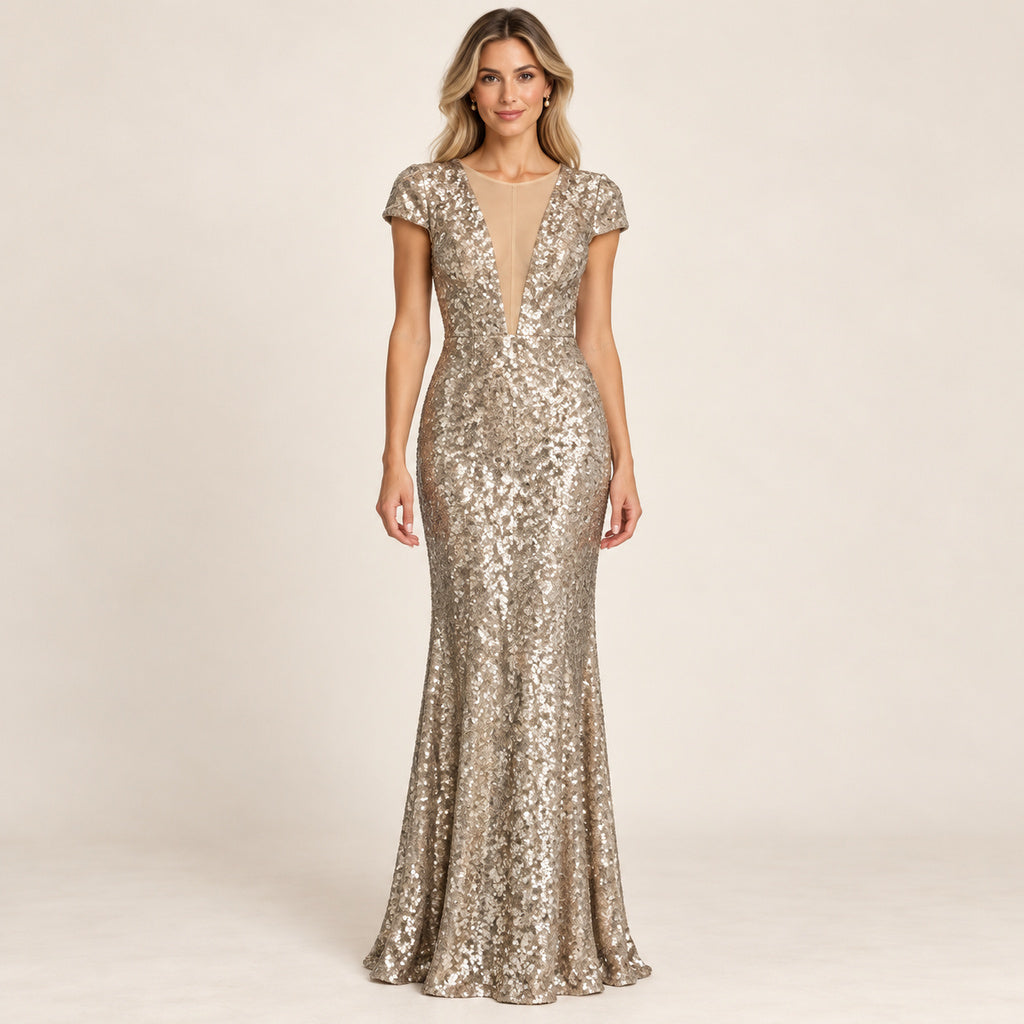 Vestido Te Popul dorado con modelo de frente y escote delantero con malla nude